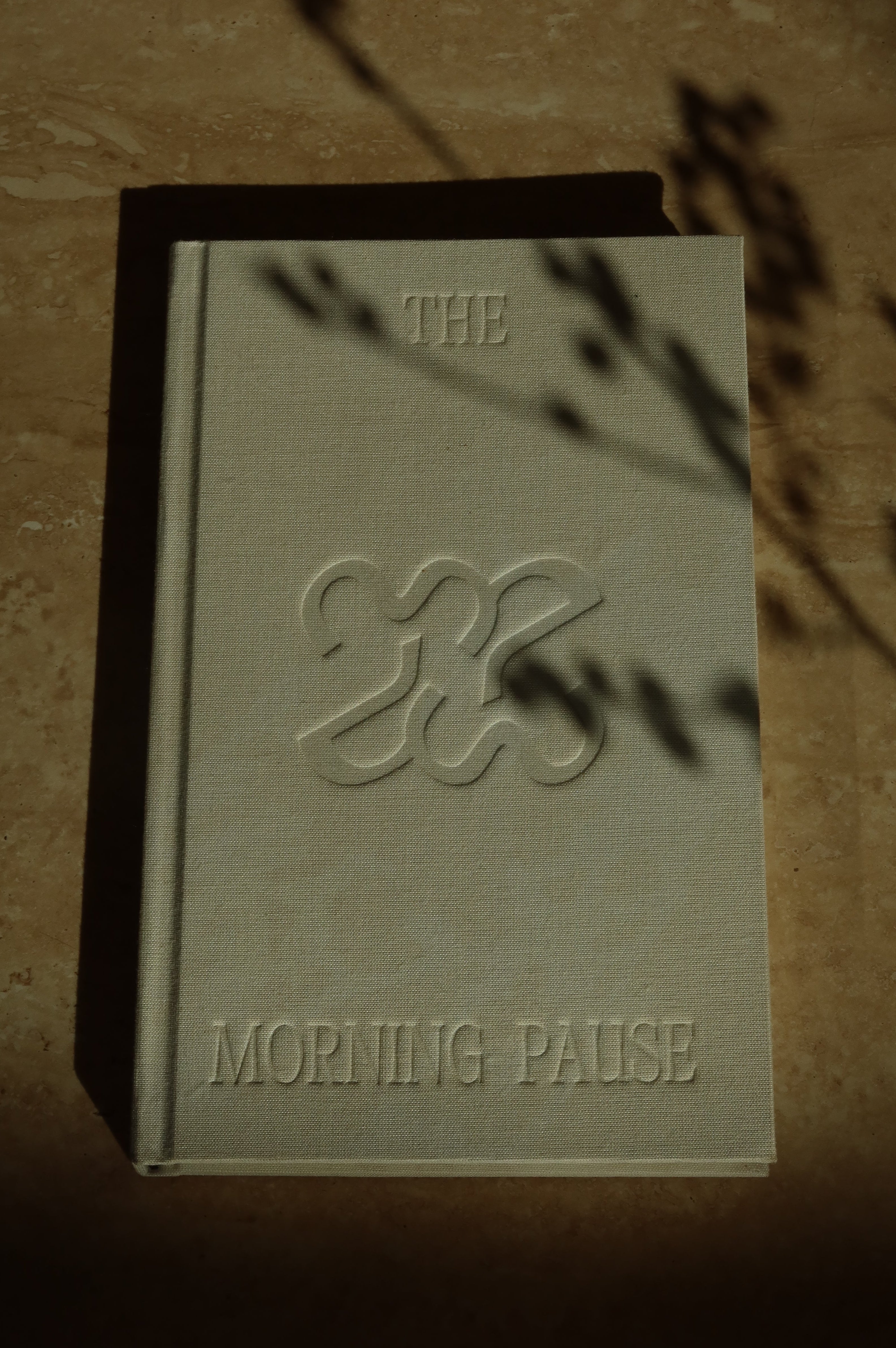 Linen-covered gratitude journal by The Morning Pause designed for slow morning routines