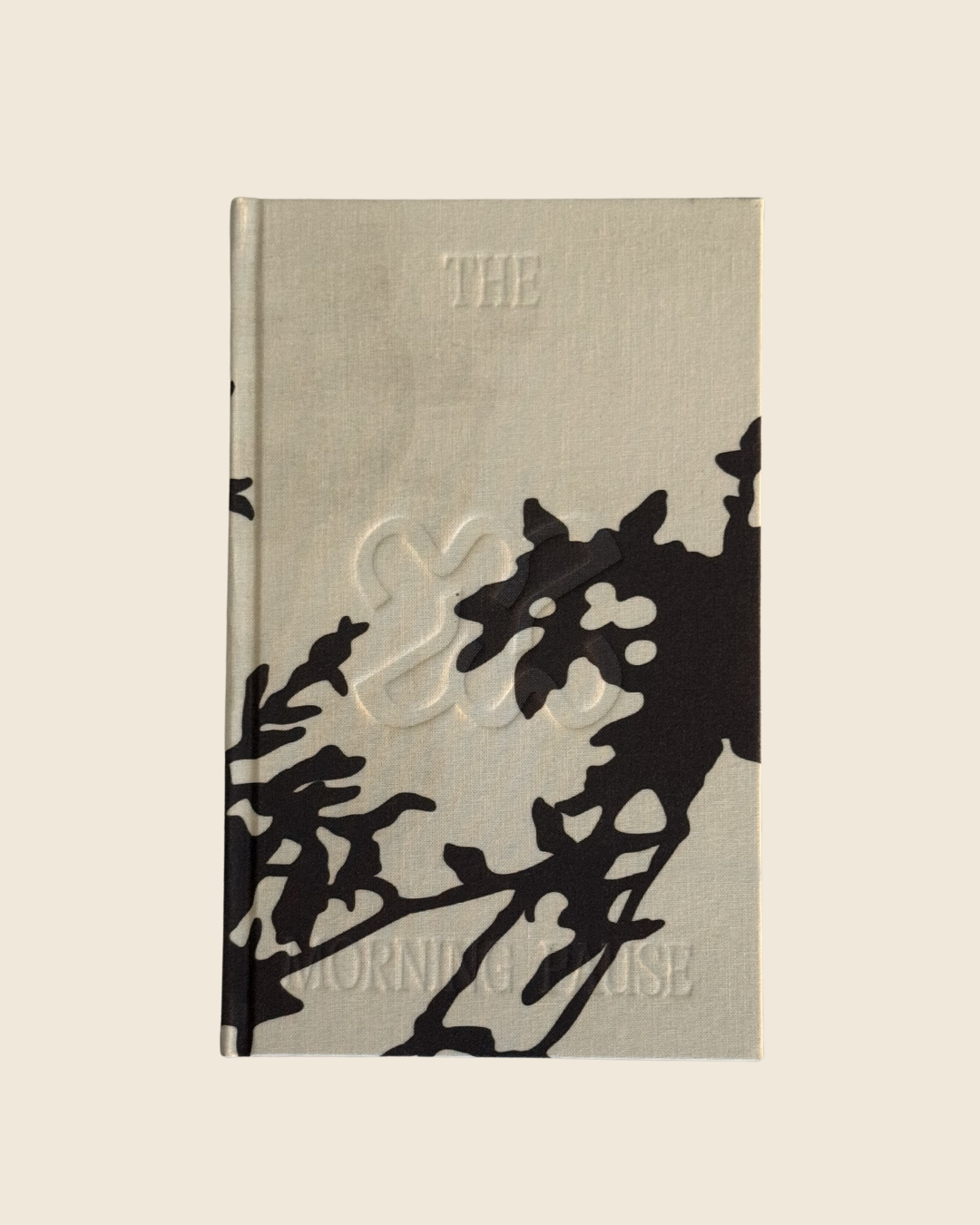 The Morning Pause gratitude journal with linen cover, embossed brand mark, and hand-painted
